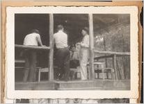 Photograph of men talking under a pavilion, Lovejoy,Georgia