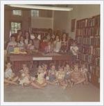 Photograph of children eating popsicles in the library, Athens, Georgia, circa 1975