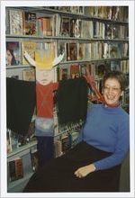 Photograph of Mary Jean Hartel with a craft creation at the Athens-Clarke County Library, Athens, Georgia, circa 1995