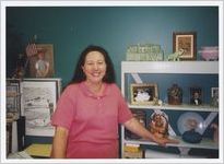 Photograph of a woman in her office at the Athens-Clarke County Library, Athens, Georgia, circa 1995