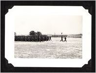 Photograph of WWII soldiers in parade at Camp Wheeler, Georgia, circa 1941