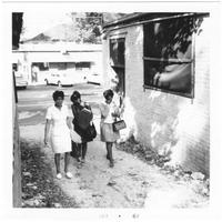 Women Walking Through Alley, October 1967