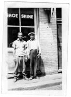 Unidentified Men in Front of a Shoe Shine Store, circa 1942