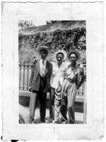 Unidentified Men Stand on the Sidewalk, circa 1942
