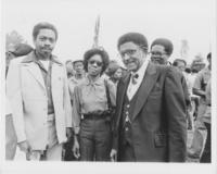 Joseph E. Lowery and Others Standing Outside in Front of a Crowd, 1979