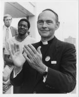 Father Austin Ford at the South African Invasion of Angola Rally, 1981