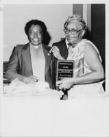 Nimrod Q. Reynolds Presents the "Distinguished Service Award" to Vera Cooley, July 1981