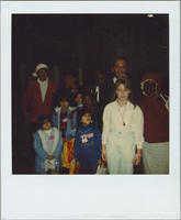 Evelyn G. Lowery and Andrew Young Posing for a Photo With Children, circa 1984