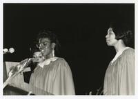 Three Unidentified Woman on Stage at Commencement at the Civic Center, 1991