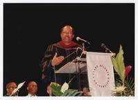 An Unidentified Man on Stage at Commencement, 1994