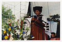 Alumna Reatha Clark King on Stage at Commencement, circa 2002