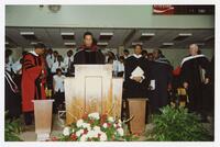 Dr. Thomas Cole with a Group of Men and Women at Convocation, circa 1994