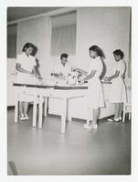 Four Unidentified Women in the Home Economics Department, Food Laboratory, E.D. Thayer Hall, 1955