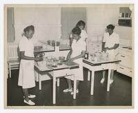 Four Unidentified Women in the Home Economics Department, Food Laboratory, E.D. Thayer Hall, 1955