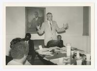 An Unidentified Man Speaks at an Event, circa 1980