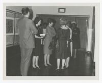 An Unidentified Group of Faculty Members in a Hallway, circa 1960