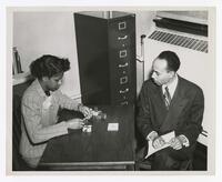 An Unidentified Man and Woman in an Office, circa 1950