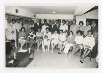 A Group Portrait of Men and Women at an Event, circa 1970