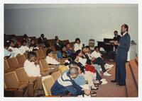 A Group of Young Men and Women in an Auditorium at an Admissions Orientation Event, circa 1985
