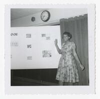 An Unidentified Woman and an Art Piece at an Art Exhibit, circa 1965