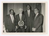 Elias Blake Jr. and Three Unidentified Men at an Award Presentation, circa 1980
