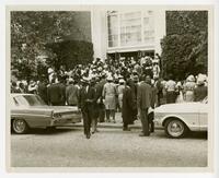 Men and Women Enter a Building at Commencement, circa 1960