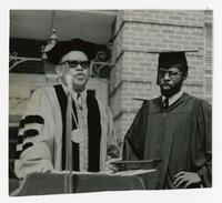Vivian W. Henderson Speaks on Stage at Commencement, circa 1965