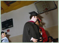 Faculty Member has Friendly Exchange with Graduate, 1979