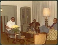 Herman Long and Two Men Seated with Vivian Henderson, circa 1970
