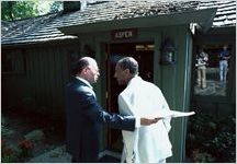 Prime Minister Begin and President Sadat at the door of President Carter's cabin at Camp David.