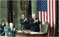 President Carter, Vice President Mondale, and Speaker of the House of Representatives Tip O'Neill applaud Prime Minister Begin and President Sadat as President Carter announces the Camp David results to a joint session of Congress.