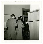 Photograph of a group of people exiting a room, Clarkesville, Habersham County, Georgia.