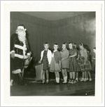 Photograph of girls lined up to greet Santa Claus, Clarkesville, Habersham County, Georgia