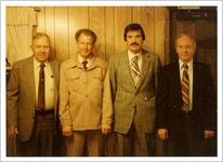 Photograph of four men in suits posed together for group portrait, Clarkesville, Habersham County, Georgia