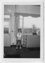 Photograph of a young woman seated on a stool, Clarkesville, Habersham County, Georgia, 1953