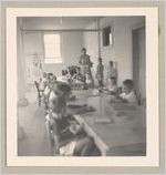 Photograph of young children seated at tables in a classroom, Clarkesville, Habersham County, Georgia, 1953