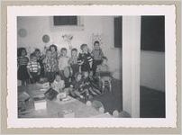 Photograph of young children gathered together in the back of a classroom, Clarkesville, Habersham County, Georgia, 1953