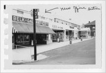 Photograph of a row of storefronts in the city business district, Clarkesville, Habersham County, Georgia, 1953