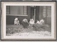 Photograph of teenage girls collecting items and depositing them in cans, Clarkesville, Habersham County, Georgia, 1953