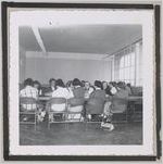 Photograph of a room full of young women seated at tables, Clarkesville, Habersham County, Georgia, 1950