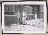 Photograph of two young men standing in front of a building, Clarkesville, Habersham County, Georgia, 1950