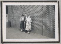 Photograph of three young people standing beside a building, Clarkesville, Habersham County, Georgia, 1950