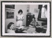 Photograph of young people working inside of an office, Clarkesville, Habersham County, Georgia, 1950