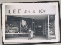 Photograph of a North Habersham High School student in front of a local five and dime store, Clarkesville, Habersham County, Georgia, 1950
