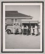 Photograph of library patrons gathered around Stephens County bookmobile, Clarkesville, Habersham County, Georgia, 1950