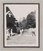Photograph of small groups of people standing outside of a church, Clarkesville, Habersham County, Georgia, 1950