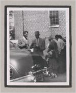 Photograph of people eating outdoors at the Clarkesville Methodist Church, Clarkesville, Habersham County, Georgia, 1950
