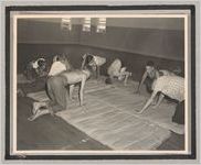 Photograph of boys exercising on mattresses, Clarkesville, Habersham County, Georgia, 1950