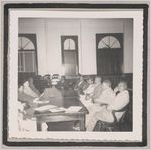 Photograph of African American men and women seated together at a table, Clarkesville, Habersham County, Georgia, 1950