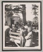 Photograph of African American families eating a picnic lunch at a gathering held at Mount Pleasant Baptist Church, Clarkesville, Habersham County, Georgia, 1950